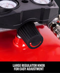 Close-up of the large regulator knob on Craftsman 6 Gallon Oil Free Pancake Air Compressor for easy adjustment.