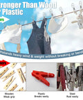 Built Like A Tank Heavy Duty Stainless Steel Clothes Pins 20 Pack Large Metal Laundry Clips holding clothes on a line outdoors.