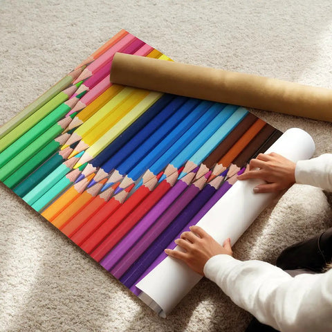 Person unrolling Totally Dope Customizable Wall Art Posters For Home Office Events And Businesses Create Your Own Text Images And Logos On Premium Quality Prints For Birthdays Weddings Parties And Promotions, featuring colorful pencil design.
