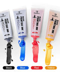 Linoleum Block Printmaking Kit With Four Color Ink showing black, blue, red, and yellow printing ink tubes with open nozzles.