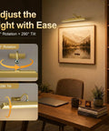 Premium Rechargeable Motion Sensor Picture Light Gold Wall Mounted Frame Illuminator with 360° rotation and 290° tilt adjustment.