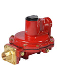 Red LP-gas first-stage regulator with brass POL x 1/2 in NPT outlet, side view