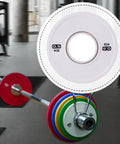 0.5 Kg Barbell Change Plate With Grooved Inner Design For Stable Lifts in white finish on gym floor setup