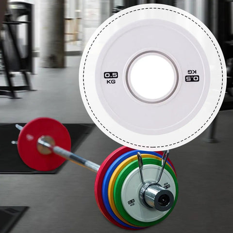 0.5 Kg Barbell Change Plate With Grooved Inner Design For Stable Lifts in white finish on gym floor setup