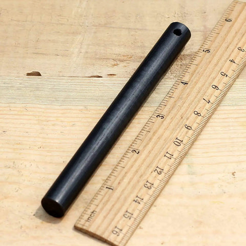 XL Survival Ferro Rod Half Inch By Five Inch Fire Starter shown with a ruler for size comparison.