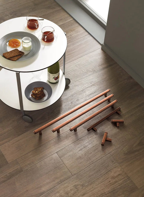 Six Pack 3 Inch Hole Center Antique Copper Zinc Alloy Cabinet Pulls For Kitchen Drawers shown on wood floor, 4.73 Inch Length