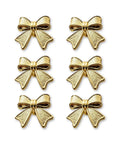 Six Piece Zinc Alloy Bow Drawer Knobs With Vintage Plating And Smooth Curved Handles For Dressers And Vanity Furniture Upgrades That Bring Main Character Energy To Your Space - Set of six antique gold bow-shaped knobs.