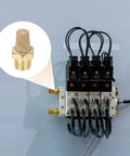 Pneumatic Exhaust Muffler Eight Piece Kit with One Eighth NPT Male Sintered Bronze Brass Fittings installed on machinery.