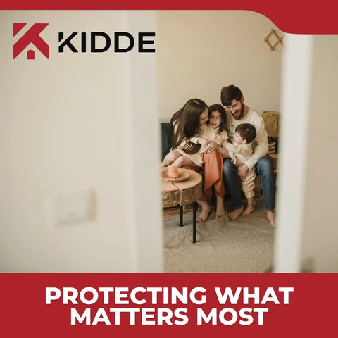 Family gathered on sofa smiling, seen through doorway, promoting Kidde security products with slogan 'Protecting What Matters Most'.