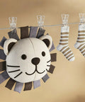 Premium Ten Pack Of Heavy Duty Spring Clips Measuring 3.5 Inches Featuring Transparent Plastic Build Solid Enough For Balloon Arch Displays And DIY Crafts With Zero Sweat Always The Go To Solution holding colorful socks above a lion plush toy.