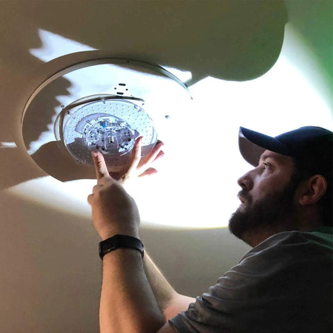 Man installing Dimmable 17W LED Light Engine 5000K 1200 Lumens 120V Retrofit Kit For Ceiling Flush Ceiling Fan Pendant Lantern Garden.