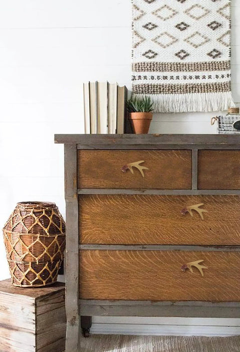 Antler Inspired Resin Cabinet Knobs Set Of 6 With Deer Horn Design installed on wooden dresser in country kitchen decor