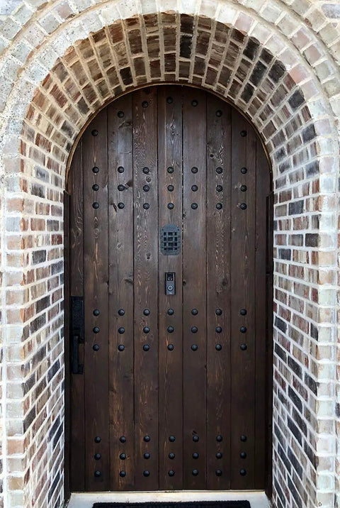 Rustic wooden door with Premium One And A Half Inch Clavos Nails With Matte Black Powder Coat Finish Built To Last Outdoor Tough As Nails Zinc Alloy Head 40 Pack Ideal For Outdoor Builds detailing.