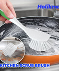 Holikme 6-pack green kitchen scrub brush with white bristles, front view cleaning a frying pan.