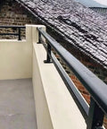 Heavy Duty Balcony Railing Fence Extender Topper No Sweat Privacy Screen Weather Tough Outdoor Barrier For Apartment Patios And Decks on a balcony.