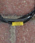 Heavy Duty Yellow 12Mm Heat Shrink Cable Labels on black cables for clear identification at job sites.