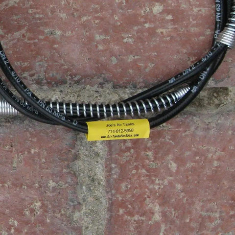 Heavy Duty Yellow 12Mm Heat Shrink Cable Labels on black cables for clear identification at job sites.