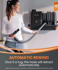 Person using Grandstorm Retractable Wall Mounted Wet Dry Vacuum Cleaner with 30 Ft Hose and 6 Nozzles for Car Detailing.