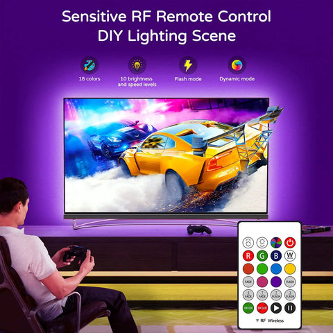 Person gaming in a room with LED Backlight Kit For 60-65 Inch TVs, 15 Ft Behind Monitor Lights With 20 Color Modes, Bias Lighting