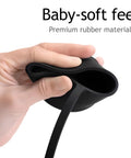 Hand holding Tesla EV Charger Plug Port Cover Waterproof Silicone Dust Cap Easy On Off No Fuss Soft Protective Cover for Tesla Charger NACS Compatible Keeps Dust Out and Plug Safe, showing flexibility and rubber material.