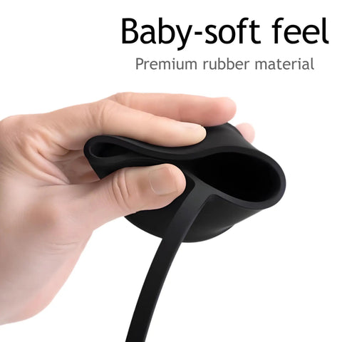 Hand holding Tesla EV Charger Plug Port Cover Waterproof Silicone Dust Cap Easy On Off No Fuss Soft Protective Cover for Tesla Charger NACS Compatible Keeps Dust Out and Plug Safe, showing flexibility and rubber material.