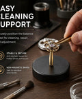 Precision Balance Wheel Holder For Mechanical Watches With Non Magnetic Brass Pin And Anti Slip Base in use on workbench