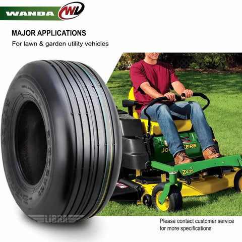 Set Of 2 13x5.00-6 Rib Turf Tires For Lawn Mowers And Utility Carts, 4 Ply Tubeless, 440 Lb Load, shown beside riding mower