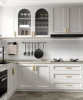 Modern kitchen with Champagne Bronze Cabinet Pulls 10 Pack 5 Inch Hole Centers 128mm Kitchen Cabinet Handles installed on white cabinets