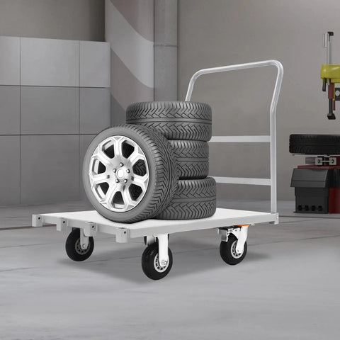 Heavy Duty Platform Truck Cart With Rock Solid Steel Deck And Smooth Roll Casters Built To Shift Two Thousand Pounds Like A Pro, transporting stacked tires in a workshop.