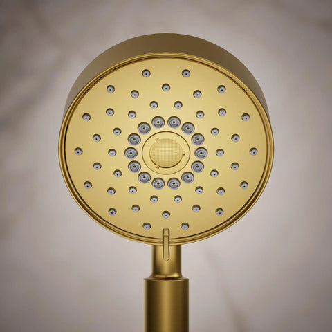 Close-up of Purist Four Function Handshower With Handheld Sprayhead Three Modes Full Coverage Pulsating Massage Silk Spray 1.75 GPM Vibrant Brushed Moderne Brass Finish.