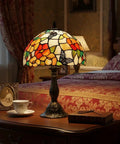 Pink Tiffany Style Table Lamp With Butterfly Stained Glass Shade, 12x12x18 Inches on wooden bedside table