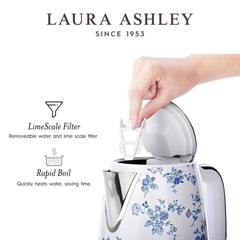 Hand opening a floral patterned electric kettle with removable limescale filter and rapid boil feature.