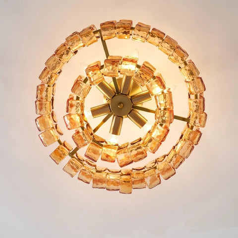 Artpad 19.69‑Inch Modern Ceiling Pendant Light, LED Living Room Lighting with amber glass and gold finish from above.