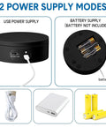 USB and battery supply options for 6 Piece Black Turner Cup Rotating Display Stand With USB Power Cable And Silent Motor Battery Backup For Kitchen Tumbler Organization Sleek Modern Accent For Your Countertop Or Office Desk Setup.