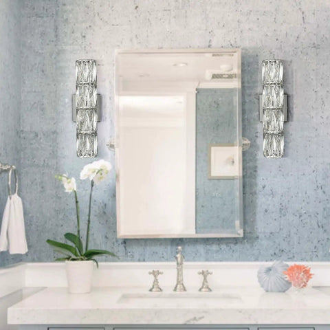 Chrome Crystal Wall Sconce With Four Lights Modern Tube Shape Glass Wall Light Fixture For Bedroom Living Room Hallway Kitchen And Vanity Sleek Dope Chrome Finish To Elevate Any Room beside a mirror.