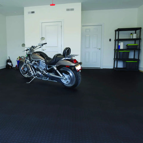 Garage with motorcycle on Interlocking 18x18 Inch Rubber Floor Tiles For Home Gym Garage Basement And Trade Show Flooring.