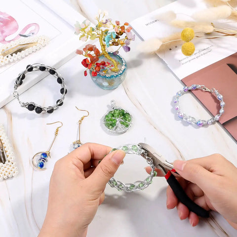 Beast Pro Grade Wire Cutters For Crafts And Jewelry Making trimming wire on a bracelet, with beads and tools visible.