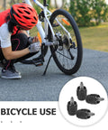 Person adjusting bike with 4 Pack Hydraulic Brake System Kit For Bikes With Olive Hose Connectors And Inserts.