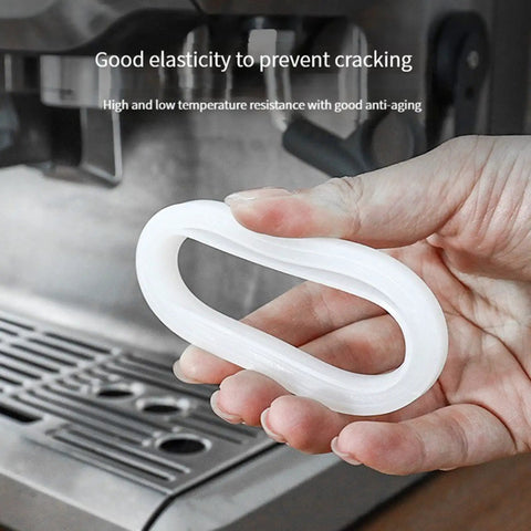 51mm Silicone Steam Ring Replacement for Espresso Machines held near Delonghi EC680 coffee maker