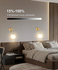 Gold Wireless Wall Sconces Set Of Two With Rechargeable Battery And Remote features adjustable brightness for a cozy bedroom ambiance.