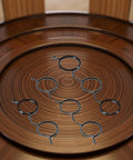 Five Pack Black Door Handle Springs Kit for Door Knob and Lever Latch Repairs, displayed on circular wooden surface