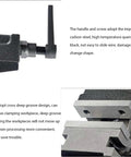 Close-up of Six Inch Tilt And Swivel Milling Machine Vise Heavy Duty Cast Iron Base showing adjustable jaws and handle.
