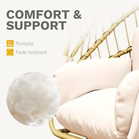Close-up of beige wicker egg chair with cushions, showcasing comfort and support. Beige Wicker Egg Chair With Stand For Indoor And Outdoor Use Foldable Hanging Hammock Cushions Included 300 Lbs Capacity Patio Garden Balcony Weather Resistant Easy Assembly Year Round Comfort Vibe.