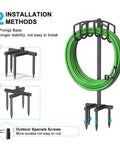 Detachable Metal Garden Hose Holder Stand With Upgraded Four Spike Design Heavy Duty Freestanding Hose Reel Rack shown with hose