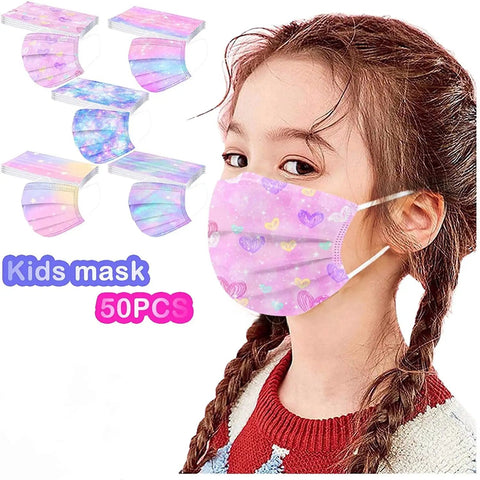 Young girl wearing pink heart-patterned Kids Disposable Face Masks, part of 50 Pack Breathable Three Layer Dust Filter Mouth Covers