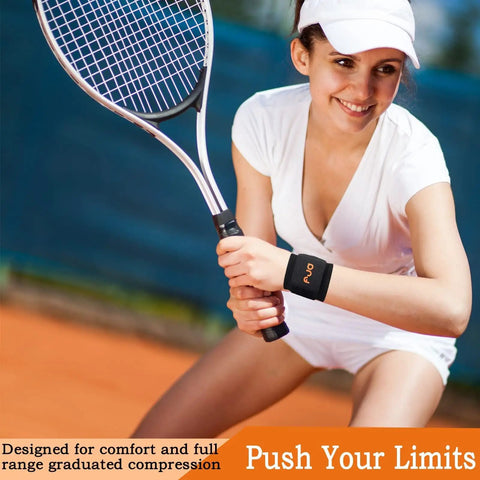 Woman playing tennis wearing 2 Pack Adjustable Wrist Support Brace For Carpal Tunnel Relief, Women And Men Pain Relief, Arthritis And Tendonitis.