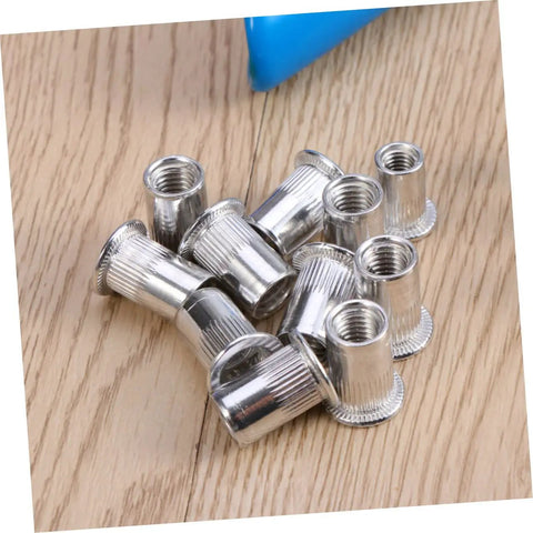 Top Tier 86Pc Heavy Duty Rivet Nut Kit M8 Threaded Rivnuts With Tool For Metal Repair And Electrical Work, The Ultimate Go-To Gear For Your Next Big Project. M8 steel rivet nuts on wood surface