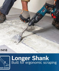 Person using SDS-Plus Bulldog Floor Scraper with 5in blade for mortar removal