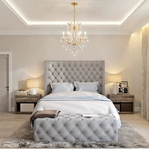 Gold Crystal Chandelier Pendant Light D22 with six lights hanging in an elegant bedroom featuring tufted headboard and soft lighting.