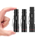 Hand holding zoomable High Lumen Tactical Flashlight With Holster Zoomable Waterproof For Hiking And Camping EDC Ready Outdoor Gear Essential 5 Mode Brightness Rechargeable Battery No AAA Battery Required.